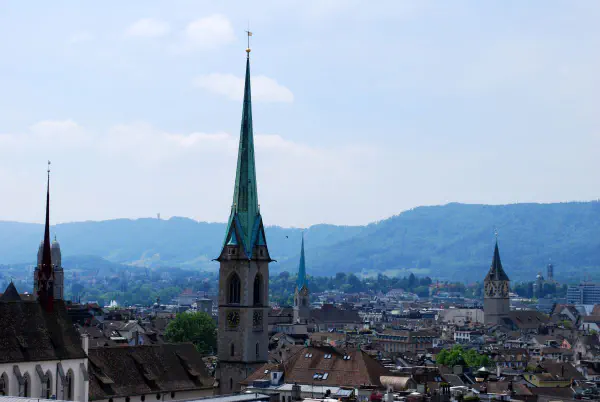 Churches (left to right): Friendenskirche; Grossmünster (with two towers, somewhat in the back); Predigerkirche (in front); Fraumünster (center, back); St. Peter