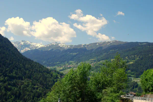 Nice views of the Swiss Alps from the side of the road to Arosa. The road is draped across the mountain in 365 bends.