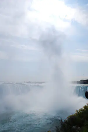 Spray from the Horseshoe Falls blocks the sun