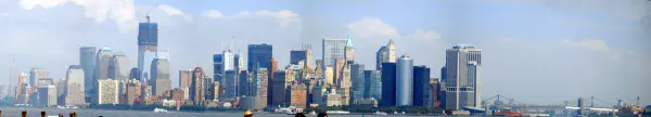 The skyline of Manhattan seen from the boat to Liberty Island, the tower under construction is one of the new towers of the WTC