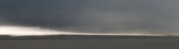 A thunderstorm is catching and overtaking us on our way back on the Staten Island Ferry