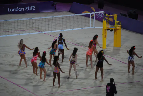 Bikini babes perform during the beach volleyball event to keep the crowd entertained