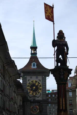 Fountain Z&auml;hringerbrunnen (Z&auml;hringen) with the clock tower in the back