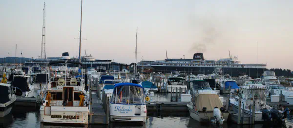 Two ferries from Ludington to Manitowoc: SS Badger (right), SS Spartan (left). The SS Spartan has been docked for decades, mostly used to scavenge parts from it to keep the SS Badger running.