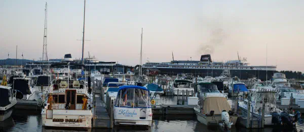 Two ferries from Ludington to Manitowoc: SS Badger (right), SS Spartan (left). The SS Spartan has been docked for decades, mostly used to scavenge parts from it to keep the SS Badger running.
